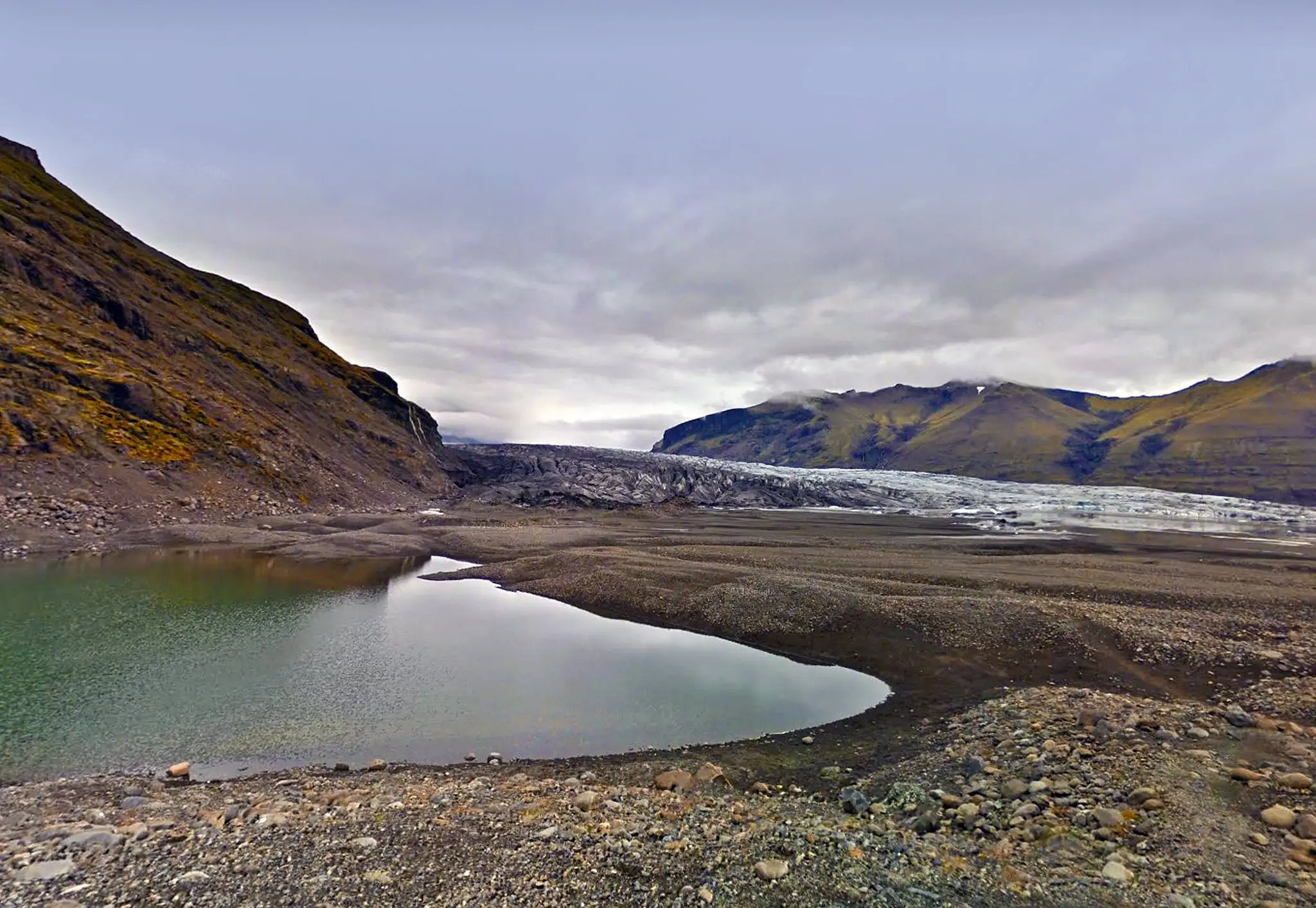 A small pond in front of Skaftafell glacier by photographer Mariejirousek